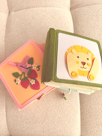 Silent book en tissu Les Mini Curieux (0–3 ans)
